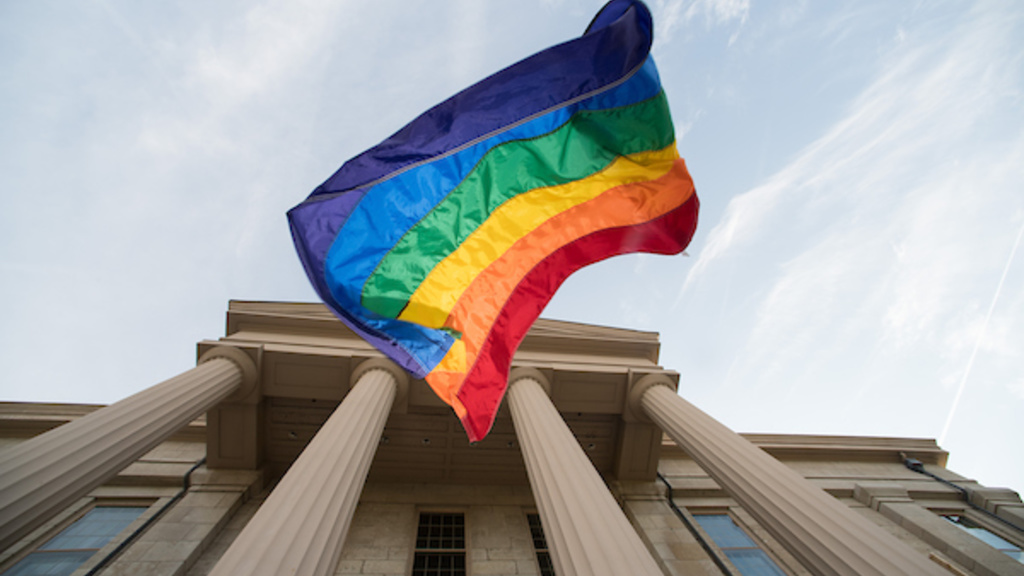 A pride flag outside the University of Iowa's Old Capitol