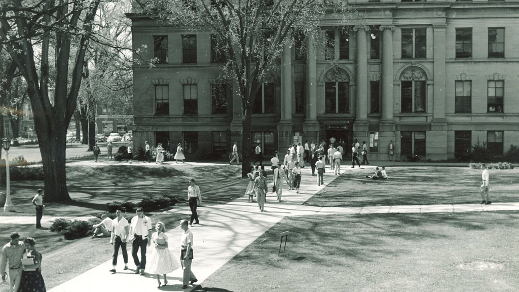 Aerial view of students on the Pentacrest near Schaeffer Hall, The University of Iowa, 1950