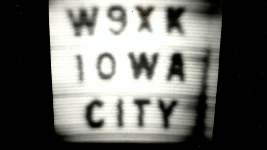 Call letters of W9XK, the University of Iowa and the world's first educational television broadcast.