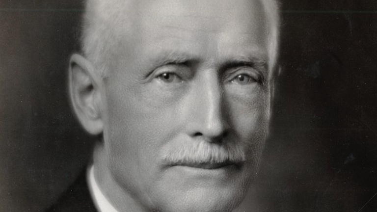 A portrait of Carl Seashore, an older white man with a mustache