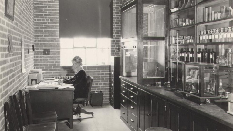 Zada Mary Cooper at work in a pharmacy lab